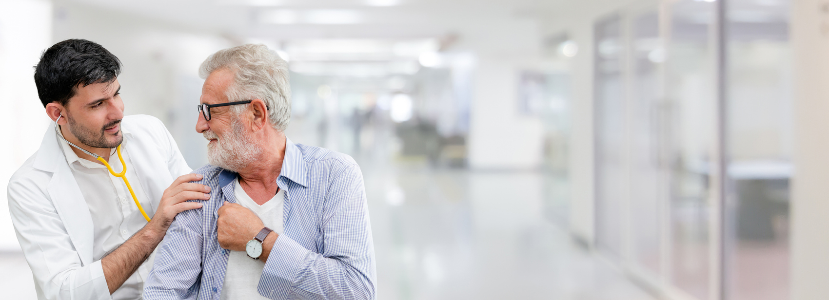 Doctor checking patient health in hospital office.